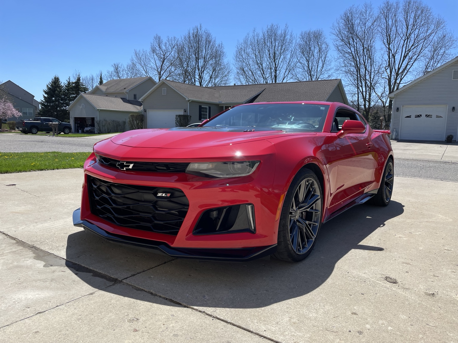 Red Chevrolet Camaro ZL1 after exterior detailing
